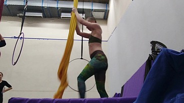 Practicing 'candycane' on silks