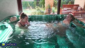 Two horny lesbians having fun in the swimming pool