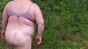 neighbor undressed in a public park and masturbates her pussy