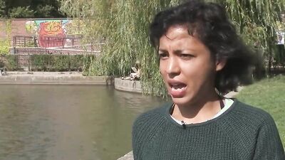 Remarkable Latina with curly hair is taking off her clothes and masturbating