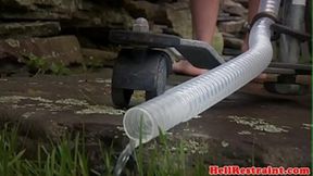 Ginger sub succumbs to enema and tight restraints