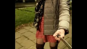Crossdresser on the walking in short dress