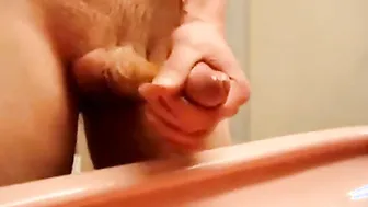 Solo guy masturbates with oil and leaks lots of precum