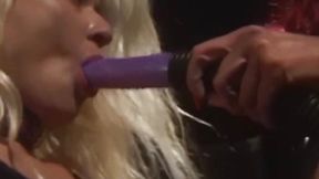 Redhead boss toys with submissive lesbian using big dildo
