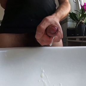 Wanking hairy cock in bathroom and cumming