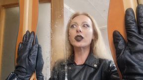 spitting on the mirror while i wear leather jacket