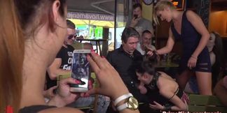 Teen submissive Rebecca worships feet in public with Steve Holmes and Cherry Kiss