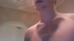 Good Looking Twink Strips and then Strokes His Cock Until He Cums