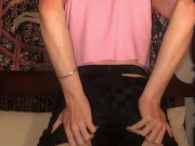 Jesse Gold plays around in a crop top, headband, and thong