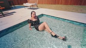Gina Gets All Shiny and Wet in a Black Satin Dress