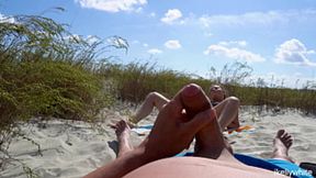 A stranger masturbates on me at the beach; I invite him to fuck me Voyeurs take note!