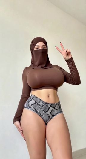 Arab hijabi dancer takes off her clothes for a steamy solo performance