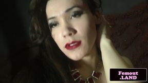 Lingerie femboi beauty teasing in photoshoot