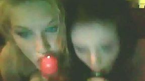 Two skanky bitches play with their soaking pussies sitting on the couch