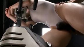 White swimsuit on spin bike