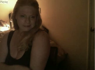 Webcam solo scene with blonde milf flashing her boobies