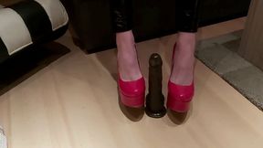 Sissy gives her Dildo an oily Footjob