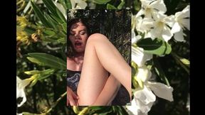 big boobed teen pleasures herself in a public garden