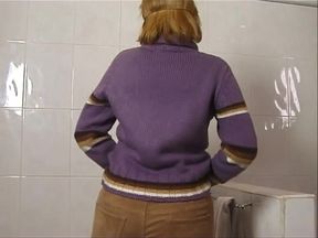 Blonde milf fucking in the toilet