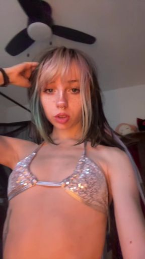 Amateur teen showcases her perky tits