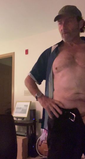 Just a guy getting home from work and getting naked.