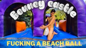 Fucking a beach ball in my bouncy castle