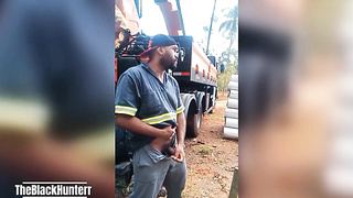 Employee Tugging at the Construction Website Covert Behind the Company Camper