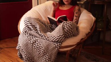 Bookworm girl gets off reading her smutty book with a rose toy