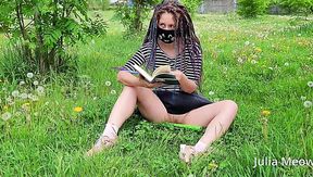 Masked bookworm Julia Meow teasing with her pussy in public