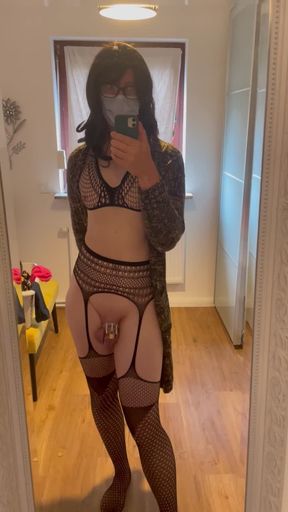 caged cutey poses in lingerie