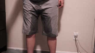 super desperate guy wets shorts