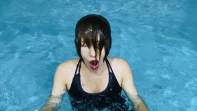 Getting wet and dunking in the pool