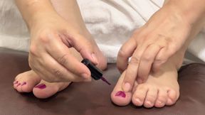 Pretty Girl Grooming Her Cute Feet with Fresh Nail Polish