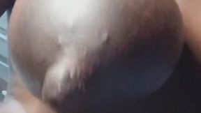 Big lactating tits closeup