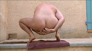 anal fisting and playing with huge toys on the pavement