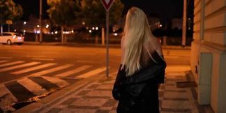 Beautiful blonde exhibitionist walks naked in the streets