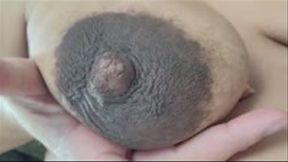 Closeups of my pregnant titties and DARK areolas