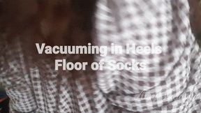 Vacuuming the floor and socks in heels