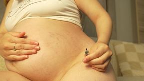 Giantess Blonde Pregnant Stepsister Shows Her Big Belly and Stretch Marks to Tiny Stepbrother Then Farts on Him