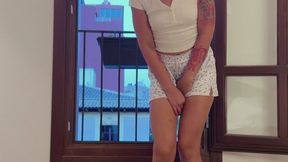 Pee pee dancing at the window pissing all over the floor