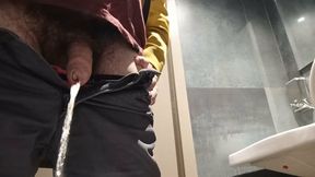 Pissing in a public toilet