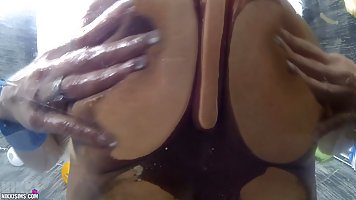 Busty redhead MILF Nikki Sims plays with food and her boobs