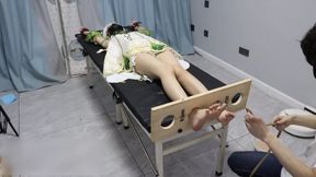 GG126-Asian girl cosplay, barefoot and bound to a bed, tickling her feet, upper body.