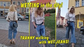Public wetting in the middle of the city!! Tranny walking with wet jeans!