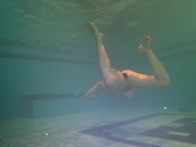 Tight ass finds dildo underwater and swims with it