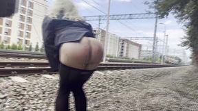 showing ass when crossdressed in the middle of the city (train)