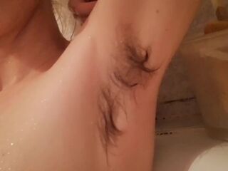 Super curly angel in the bathtub cleaning herself