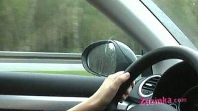 Zuzinka drives a car and masturbates her pussy