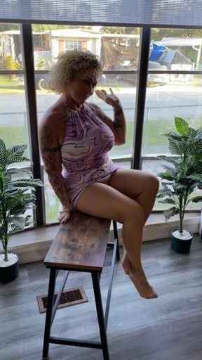 having a little fun in front of a bay window for all to see