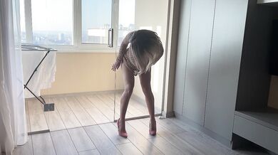 milf fucks herself with a huge cock and gets a squirt